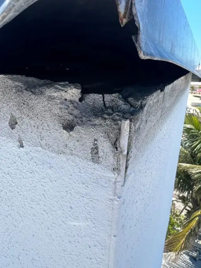 Damaged chimney crown and masonry